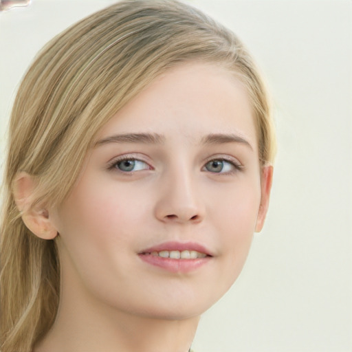 Joyful white child female with long  brown hair and blue eyes