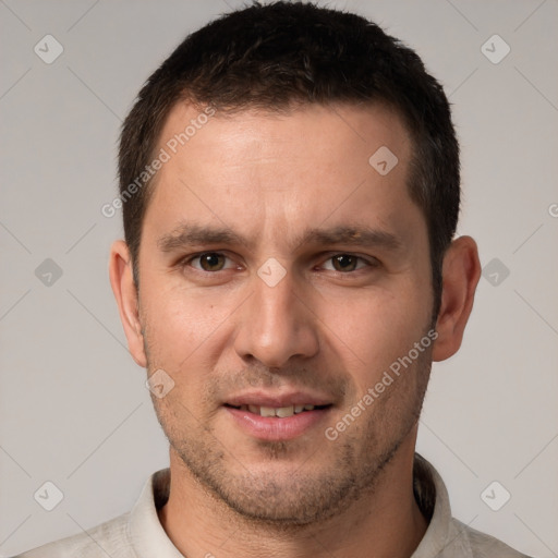 Joyful white young-adult male with short  brown hair and brown eyes