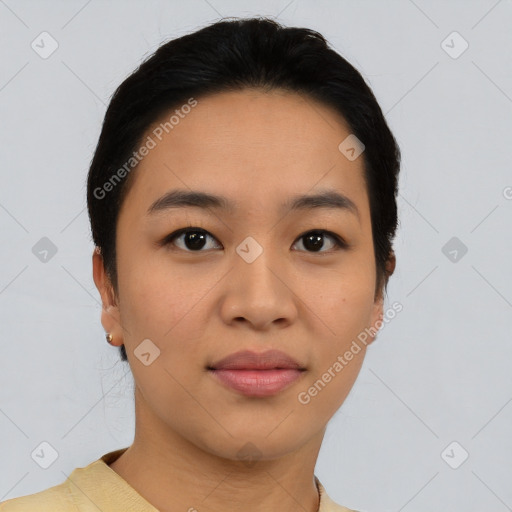 Joyful asian young-adult female with short  black hair and brown eyes