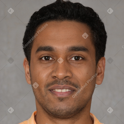 Joyful latino young-adult male with short  brown hair and brown eyes