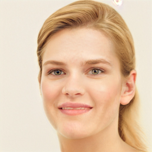 Joyful white young-adult female with long  brown hair and blue eyes