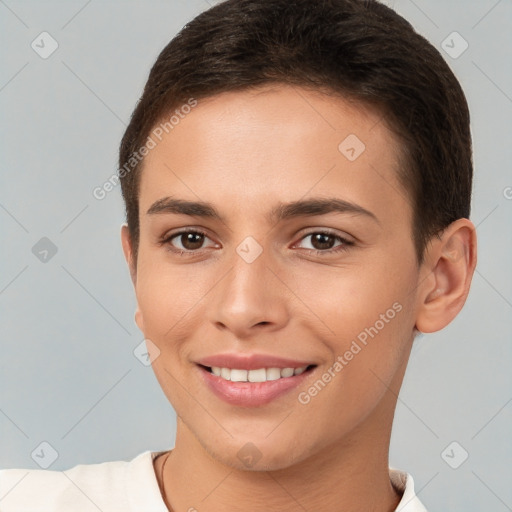 Joyful white young-adult female with short  brown hair and brown eyes