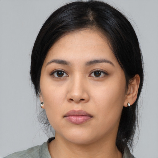 Neutral asian young-adult female with medium  black hair and brown eyes