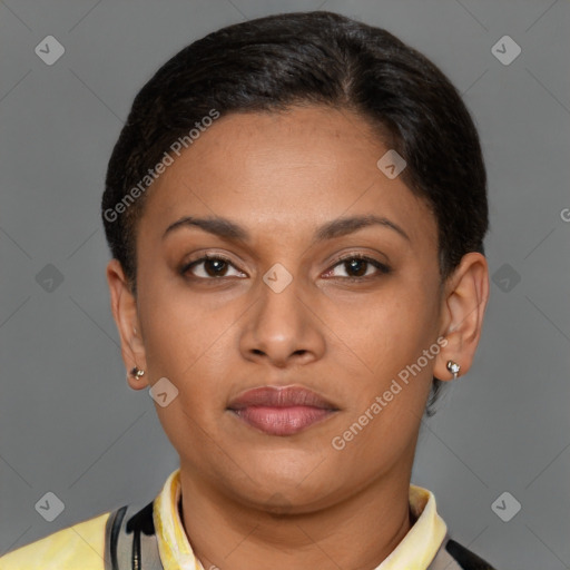 Joyful latino young-adult female with short  brown hair and brown eyes