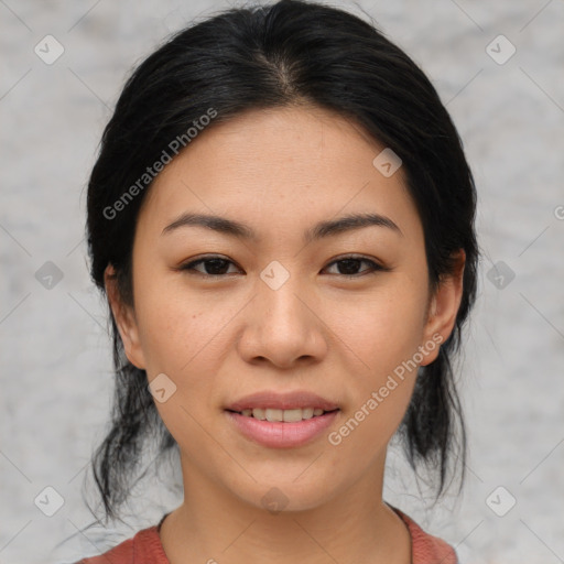 Joyful asian young-adult female with medium  black hair and brown eyes