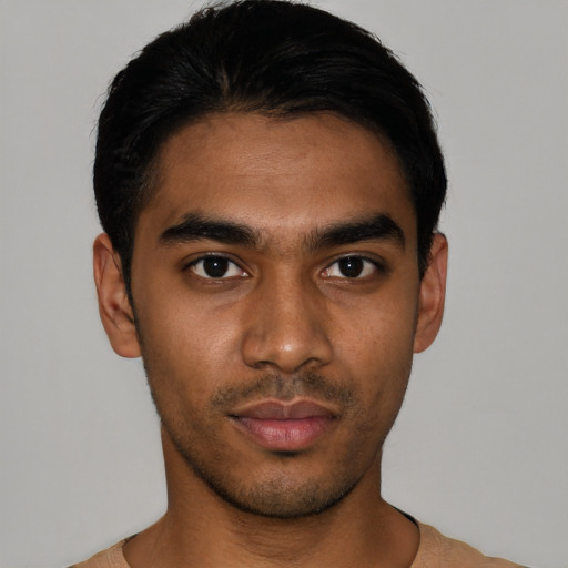Neutral latino young-adult male with short  black hair and brown eyes