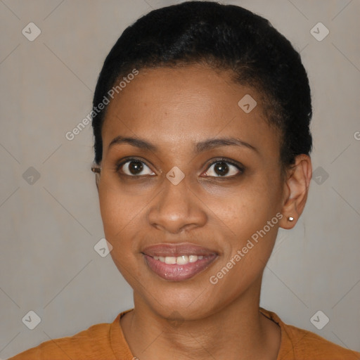 Joyful black young-adult female with short  brown hair and brown eyes