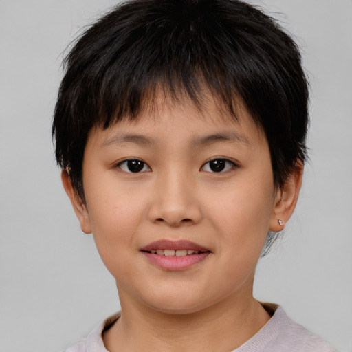 Joyful white child female with short  brown hair and brown eyes