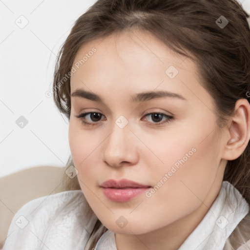 Neutral white young-adult female with medium  brown hair and brown eyes