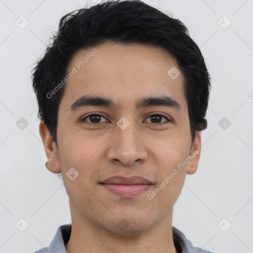 Joyful latino young-adult male with short  black hair and brown eyes