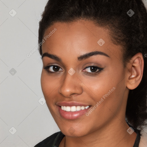 Joyful latino young-adult female with long  black hair and brown eyes