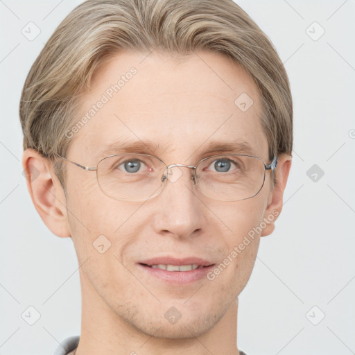 Joyful white adult male with short  brown hair and grey eyes