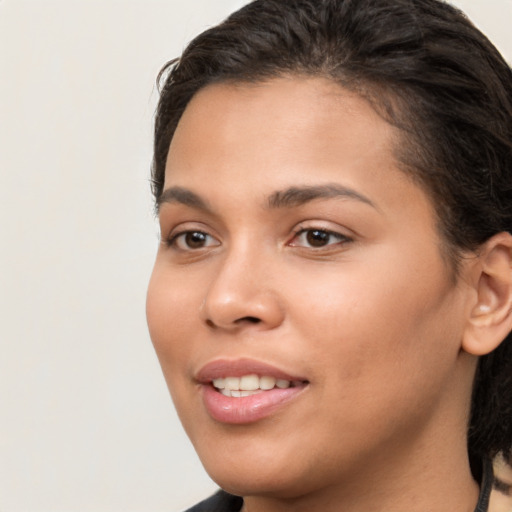 Joyful white young-adult female with medium  brown hair and brown eyes