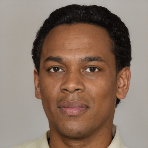 Neutral black young-adult male with short  black hair and brown eyes