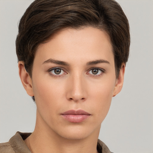 Neutral white young-adult female with short  brown hair and brown eyes