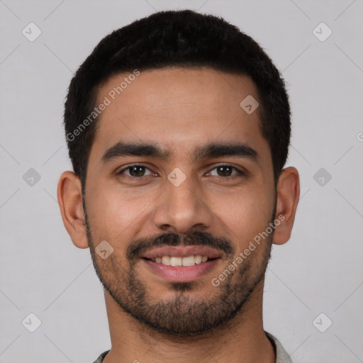 Joyful latino young-adult male with short  black hair and brown eyes