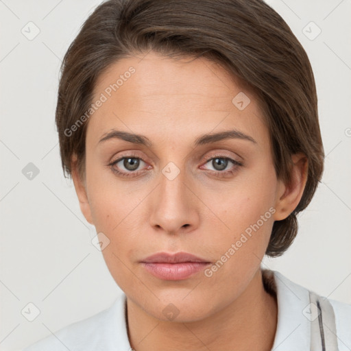 Neutral white young-adult female with short  brown hair and brown eyes