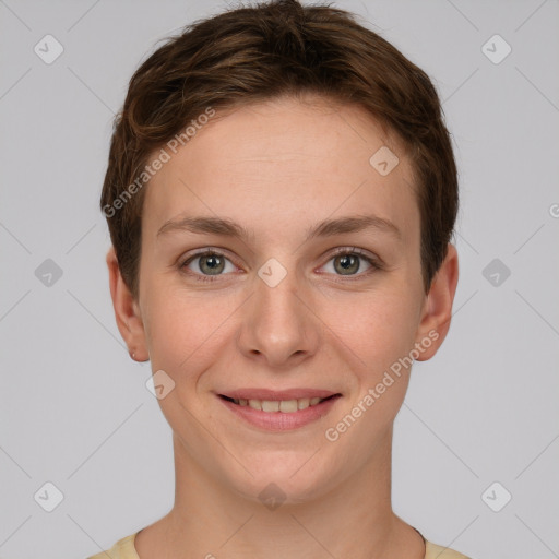 Joyful white young-adult female with short  brown hair and grey eyes