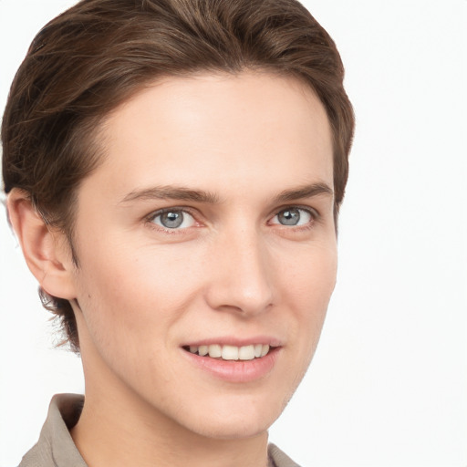 Joyful white young-adult female with short  brown hair and grey eyes