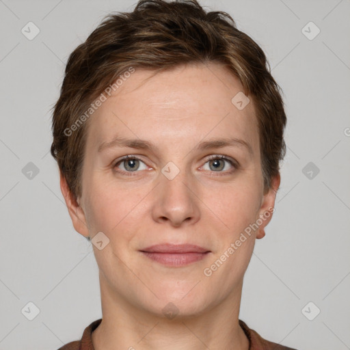 Joyful white adult female with short  brown hair and grey eyes