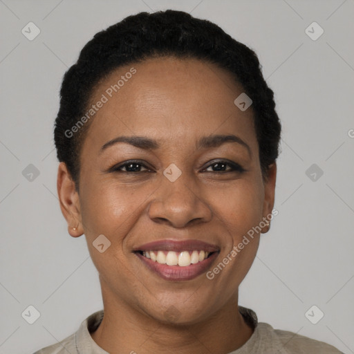 Joyful latino young-adult female with short  black hair and brown eyes