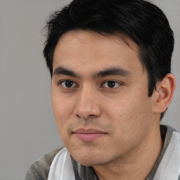 Neutral white young-adult male with short  black hair and brown eyes