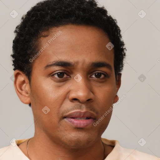Neutral black young-adult male with short  brown hair and brown eyes