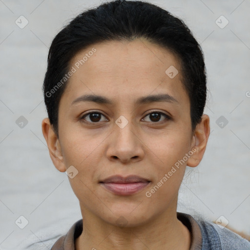 Joyful latino young-adult female with short  brown hair and brown eyes