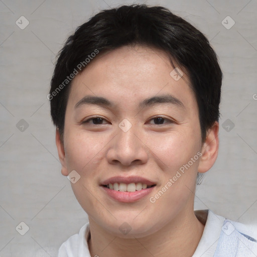 Joyful asian young-adult male with short  black hair and brown eyes