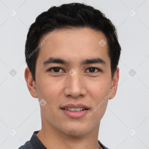 Joyful white young-adult male with short  black hair and brown eyes