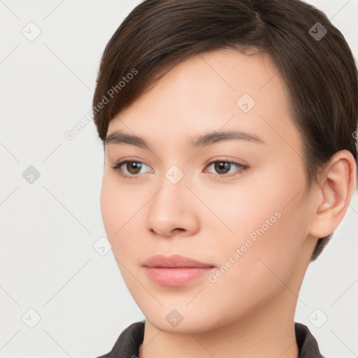 Neutral white young-adult female with long  brown hair and brown eyes