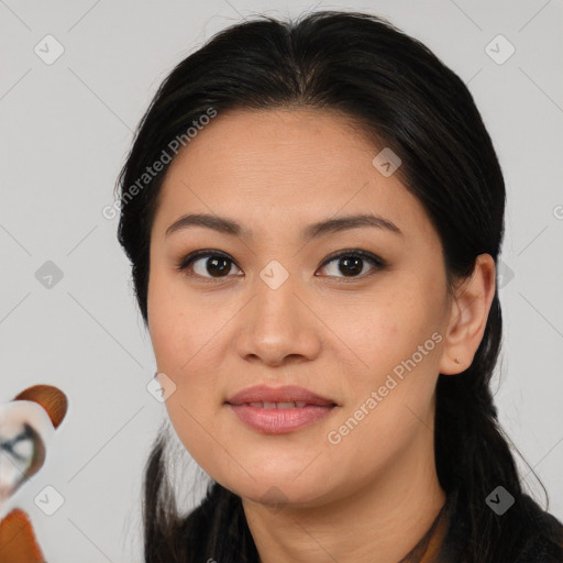 Joyful asian young-adult female with medium  brown hair and brown eyes