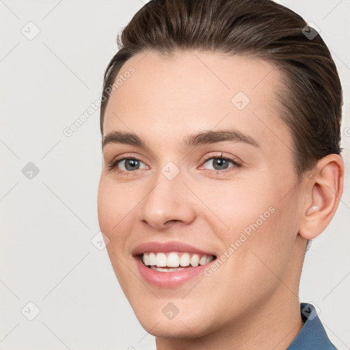 Joyful white young-adult female with short  brown hair and brown eyes