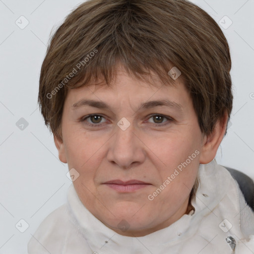 Joyful white adult female with short  brown hair and brown eyes