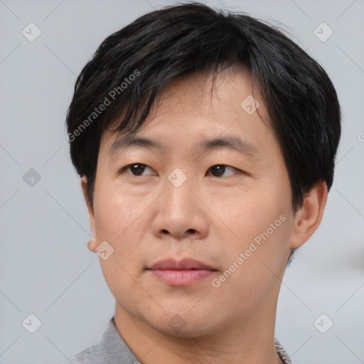 Neutral asian adult male with short  brown hair and brown eyes