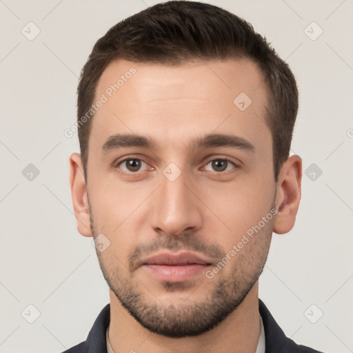 Neutral white young-adult male with short  brown hair and brown eyes