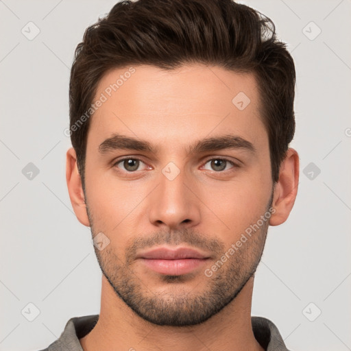 Neutral white young-adult male with short  brown hair and brown eyes