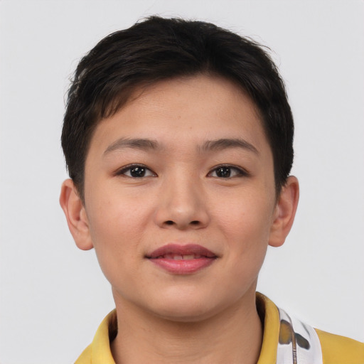 Joyful asian young-adult female with short  brown hair and brown eyes