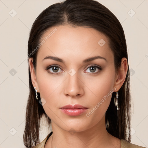 Neutral white young-adult female with long  brown hair and brown eyes