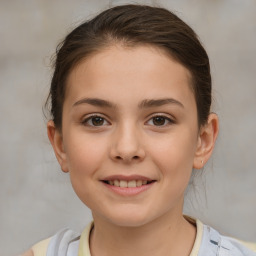 Joyful white child female with short  brown hair and brown eyes