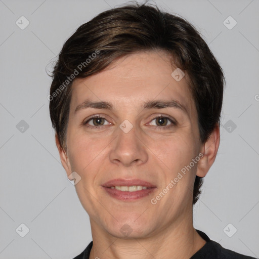 Joyful white adult female with short  brown hair and brown eyes