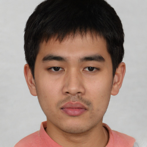 Neutral asian young-adult male with short  black hair and brown eyes