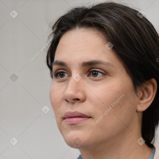 Neutral white young-adult female with short  brown hair and brown eyes