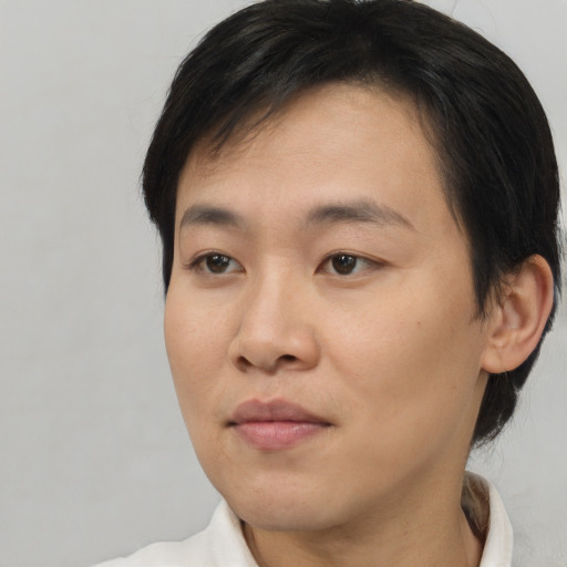 Neutral asian young-adult female with short  brown hair and brown eyes