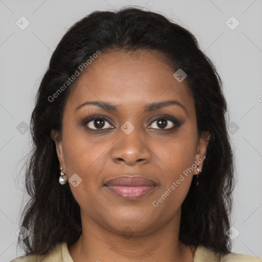 Joyful black young-adult female with long  brown hair and brown eyes