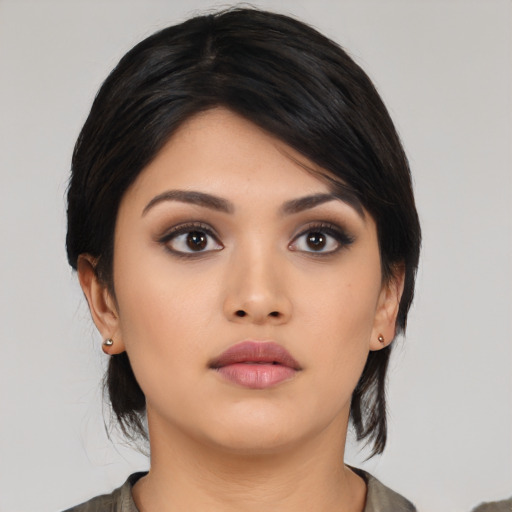 Neutral asian young-adult female with medium  black hair and brown eyes