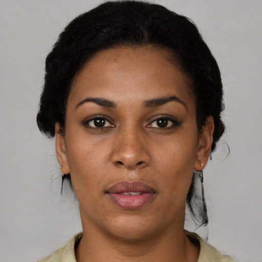 Neutral black young-adult female with short  black hair and brown eyes