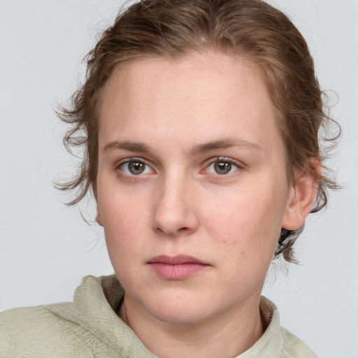 Neutral white young-adult female with medium  brown hair and grey eyes