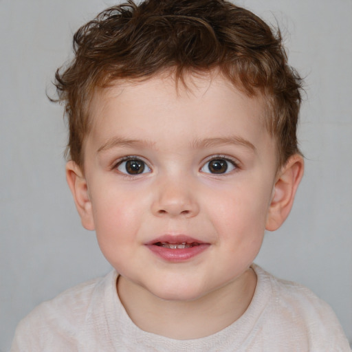 Joyful white child male with short  brown hair and brown eyes