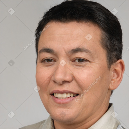 Joyful white adult male with short  brown hair and brown eyes